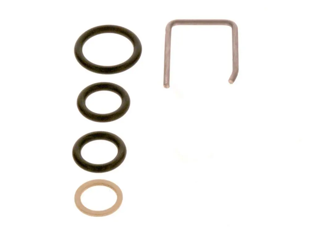 Schwarze O-Ringe in verschiedenen Größen und ein metallischer C-Clip, angeordnet auf einem weißen Hintergrund. Teile von Bosch, möglicherweise für einen Schalldämpfer.